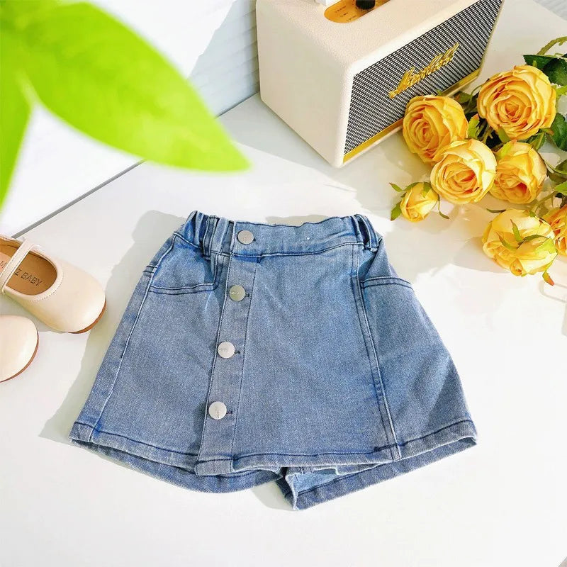 Kids casual denim skort with silver buttons and a flattering fit."